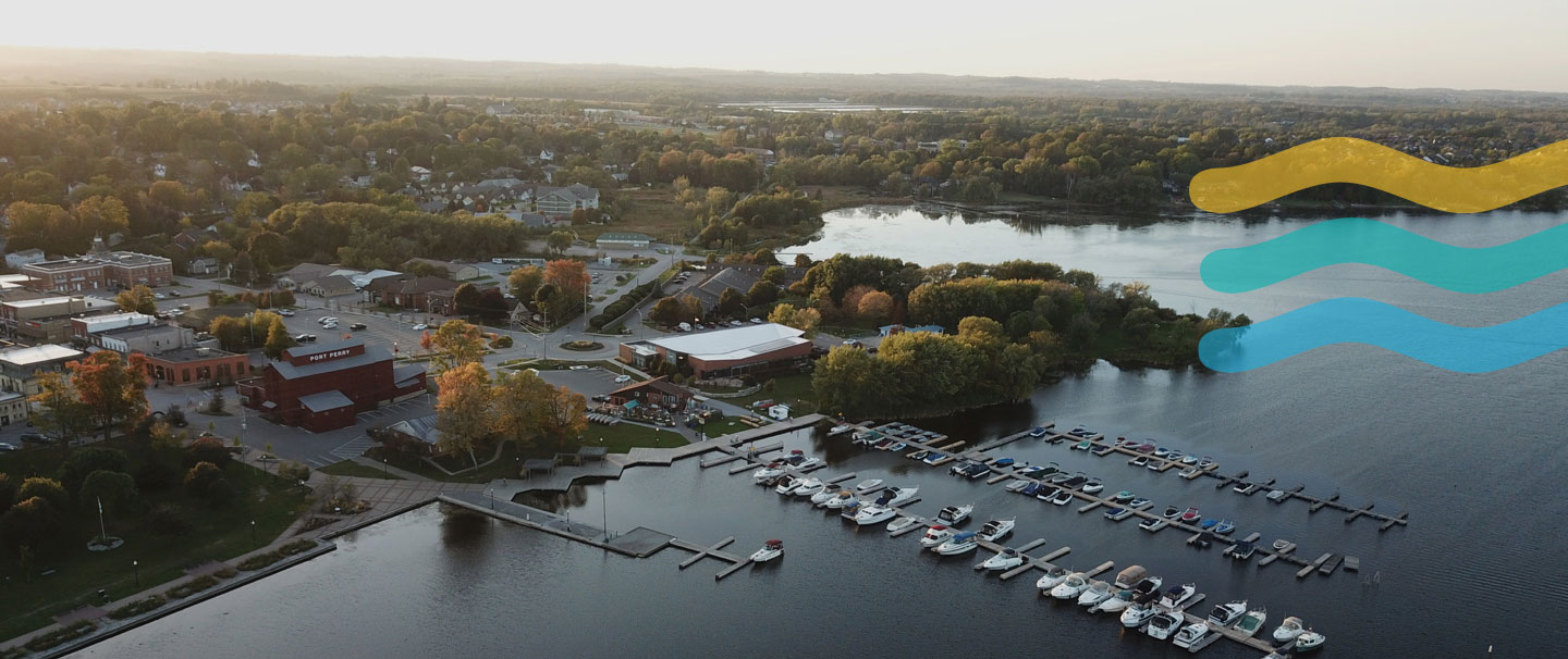 Aerial view of lakeside town & marina